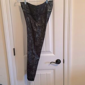 Lululemon leggings size 14 black background with flower design, worn only twice